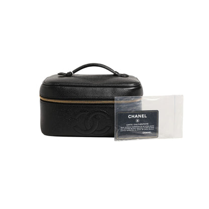 Chanel Black and gold makeup bag