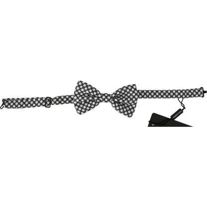 Dolce Gabbana adjustable silk bow tie in black and white circles with adjustable strap, brand new with tags.