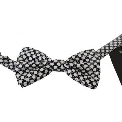 Dolce Gabbana adjustable silk bow tie in black and white circles pattern, 100% silk, made in Italy.