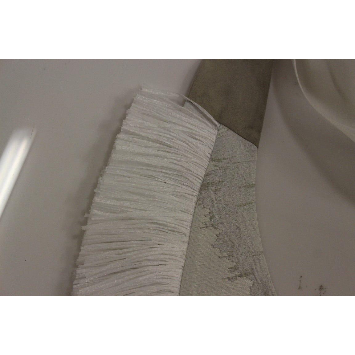 سترة Arzu Kaprol أنيقة ذات ظهر مفتوح ومزينة بشراشيب