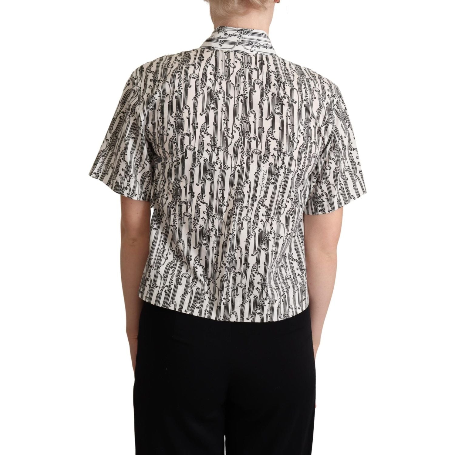 قميص بولو قطني أنيق مزين بالزهور من دولتشي آند غابانا