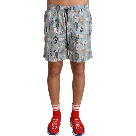 Dolce & Gabbana Blue Seashell Beachwear Swimwear Shorts 1728,67345645728,Blue,Clothing,Dolce & Gabbana,IT3 | XS,Material: 100% Polyester,Men,Men - Clothing,New with tags,Swim Shorts - Swimwear - Clothing,Swimwear - Clothing,Swimwear - Men - Clothing