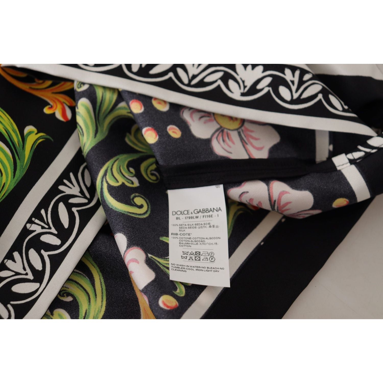 بلوزة دولتشي آند غابانا الحريرية ذات الياقة المستديرة والمزينة بنقشة الزهور