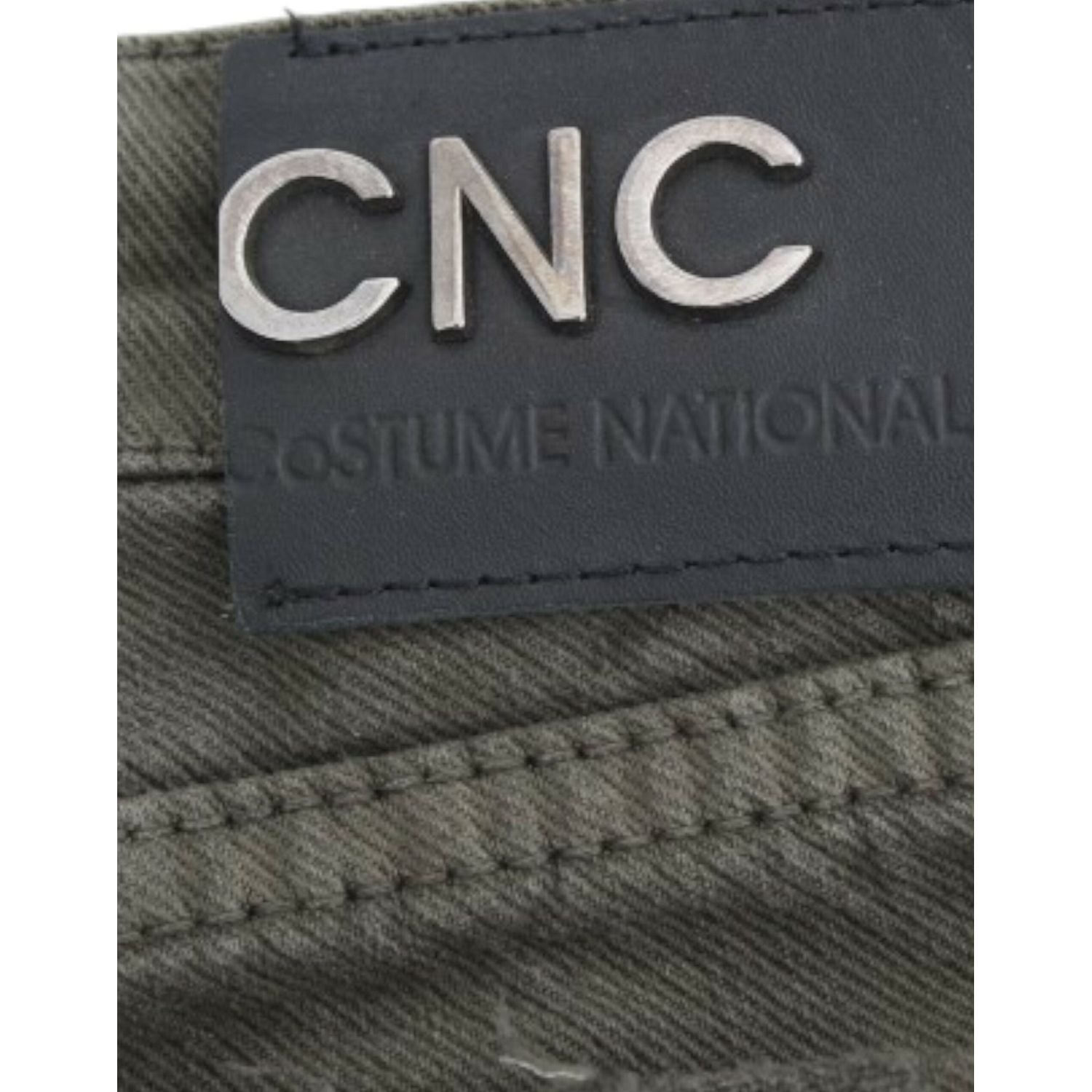 بنطلون جينز ضيق باللون الأخضر من تصميم كوستيوم ناشيونال شيك