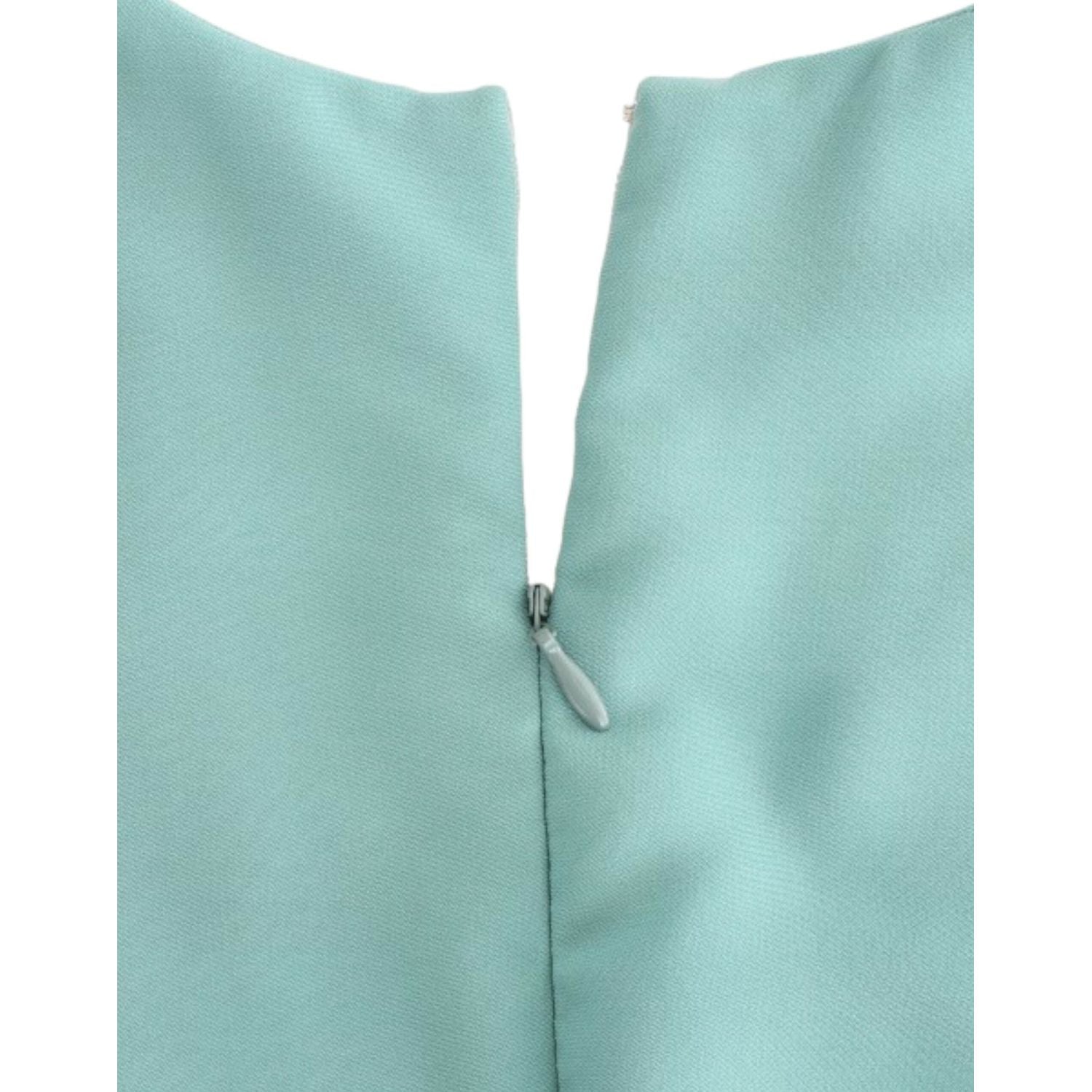 فستان ميدي أنيق باللون الأخضر بفتحة رقبة على شكل حرف V من كوستيوم ناتشورال