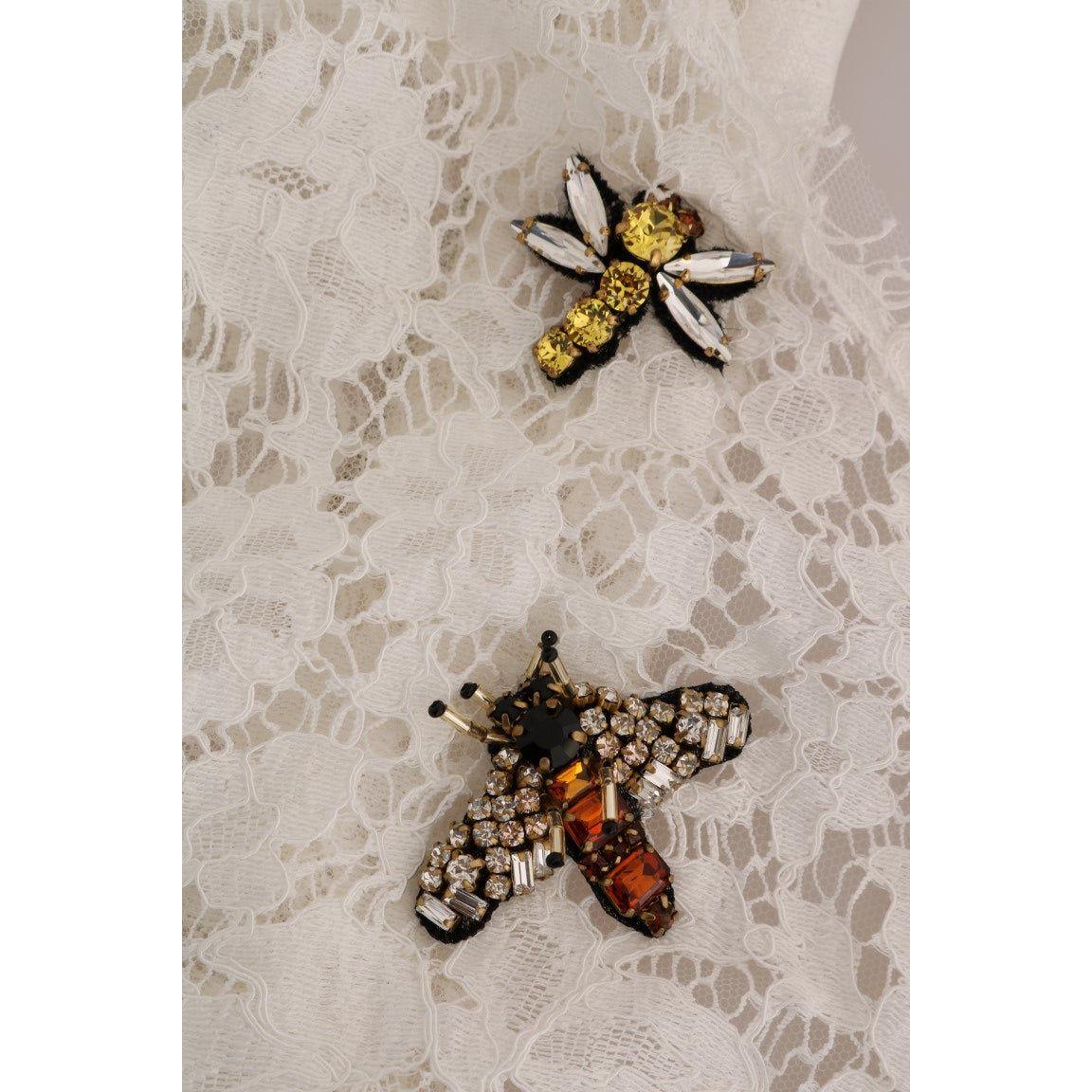 بلوزة ميني أنيقة مزينة بالدانتيل باللون الأبيض من دولتشي آند غابانا