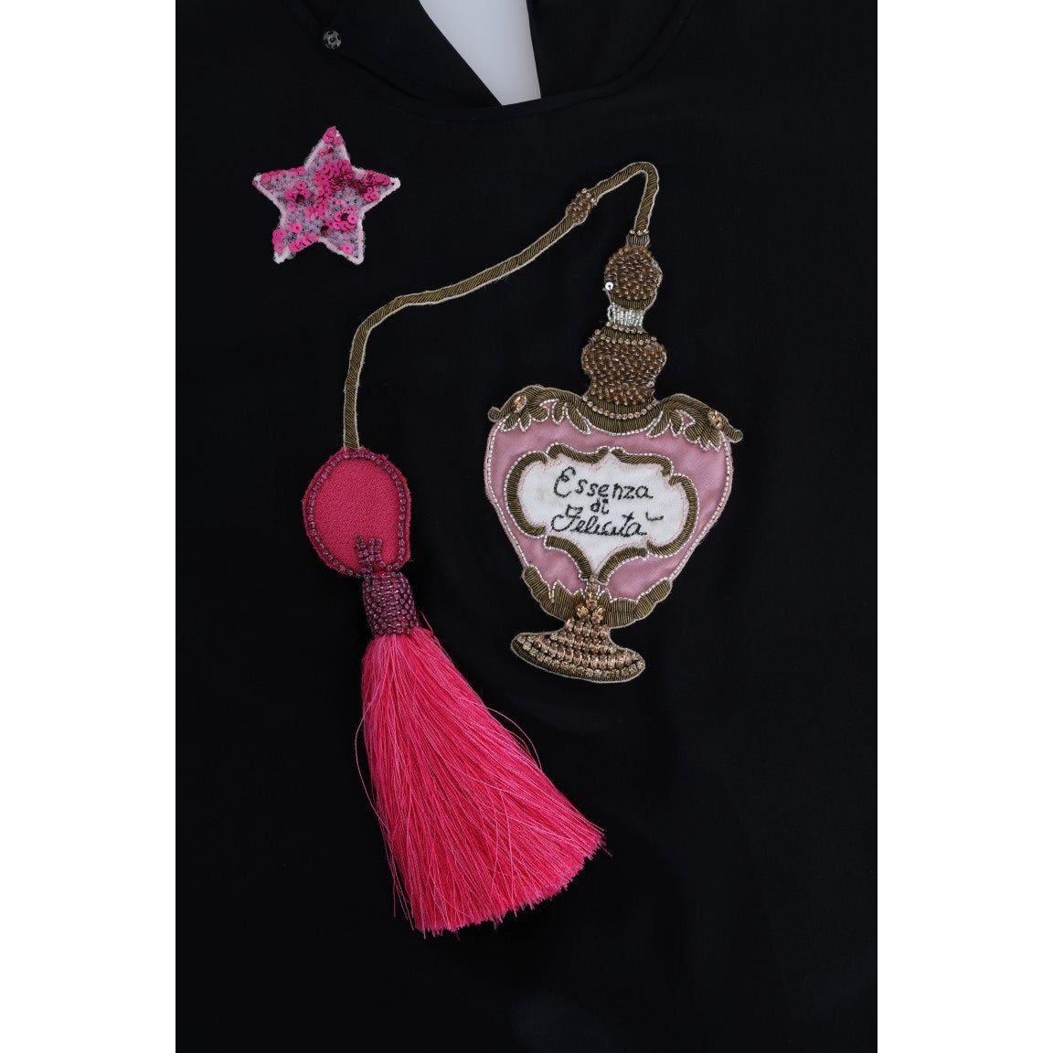 بلوزة من الحرير المطرزة برسومات خيالية من دولتشي آند غابانا