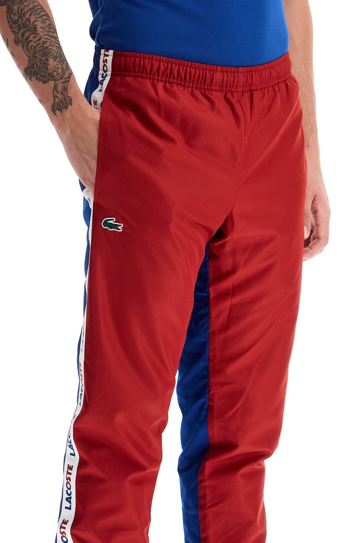 Lacoste with logo and color block design Trousers Lacoste